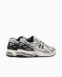 Scarpe NEW BALANCE 1906 bianco nero e argento