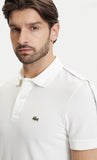 Polo Lacoste bianca con banda logata