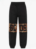 Pantalone GCDS DONNA effetto animalier
