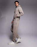 Tuta ARMANI total beige logo bianco