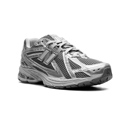 Scarpe NEW BALANCE 1906 argento