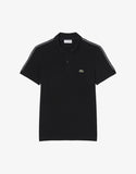 Polo Lacoste nera con banda logata