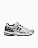 Scarpe NEW BALANCE 1906 bianco nero  e argento