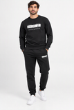 Tuta completa ARMANI nera con felpa girocollo e pantaloni coordinati.